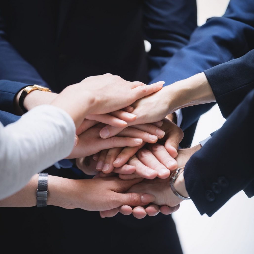 hands-stack-business-people hands-stack-business-people